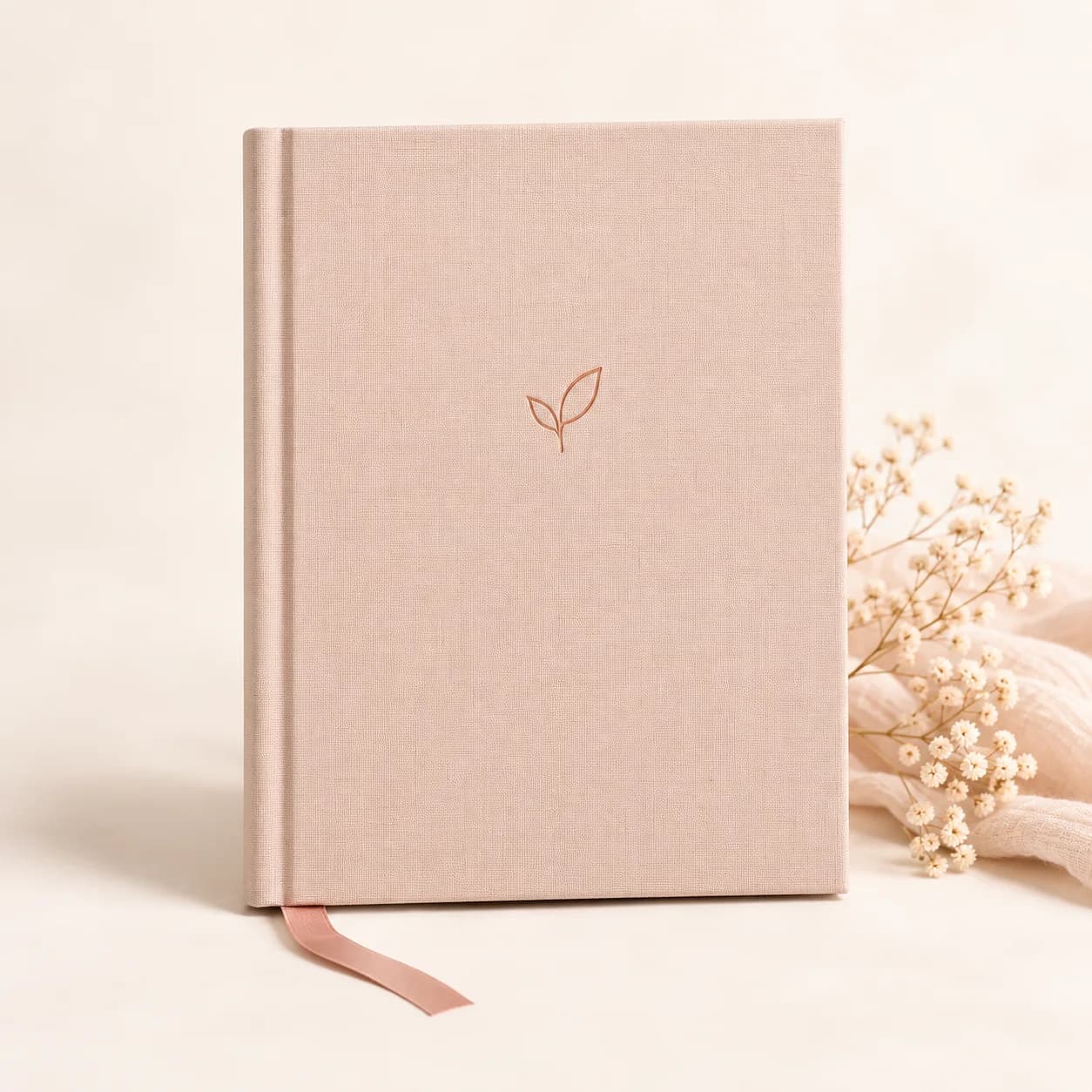 Parenting journal and pen prepared for planning